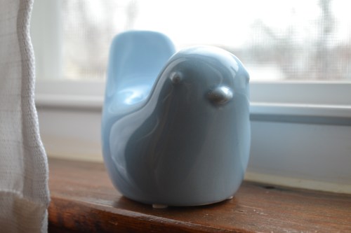 a ceramic bird that came with a hydrangea my colleagues at work sent after Anderson was born