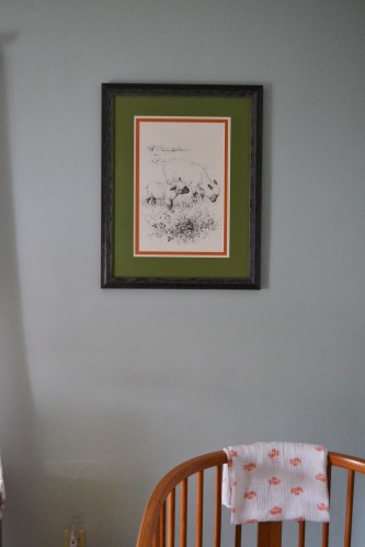 I had it framed with matting pulled from colors in his room