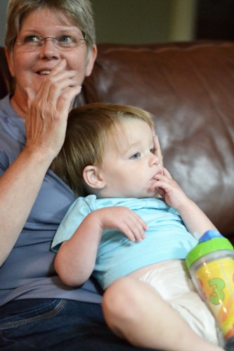Someone was super chill on Grammy's lap after swimming...for about two minutes before he was up running laps again.  